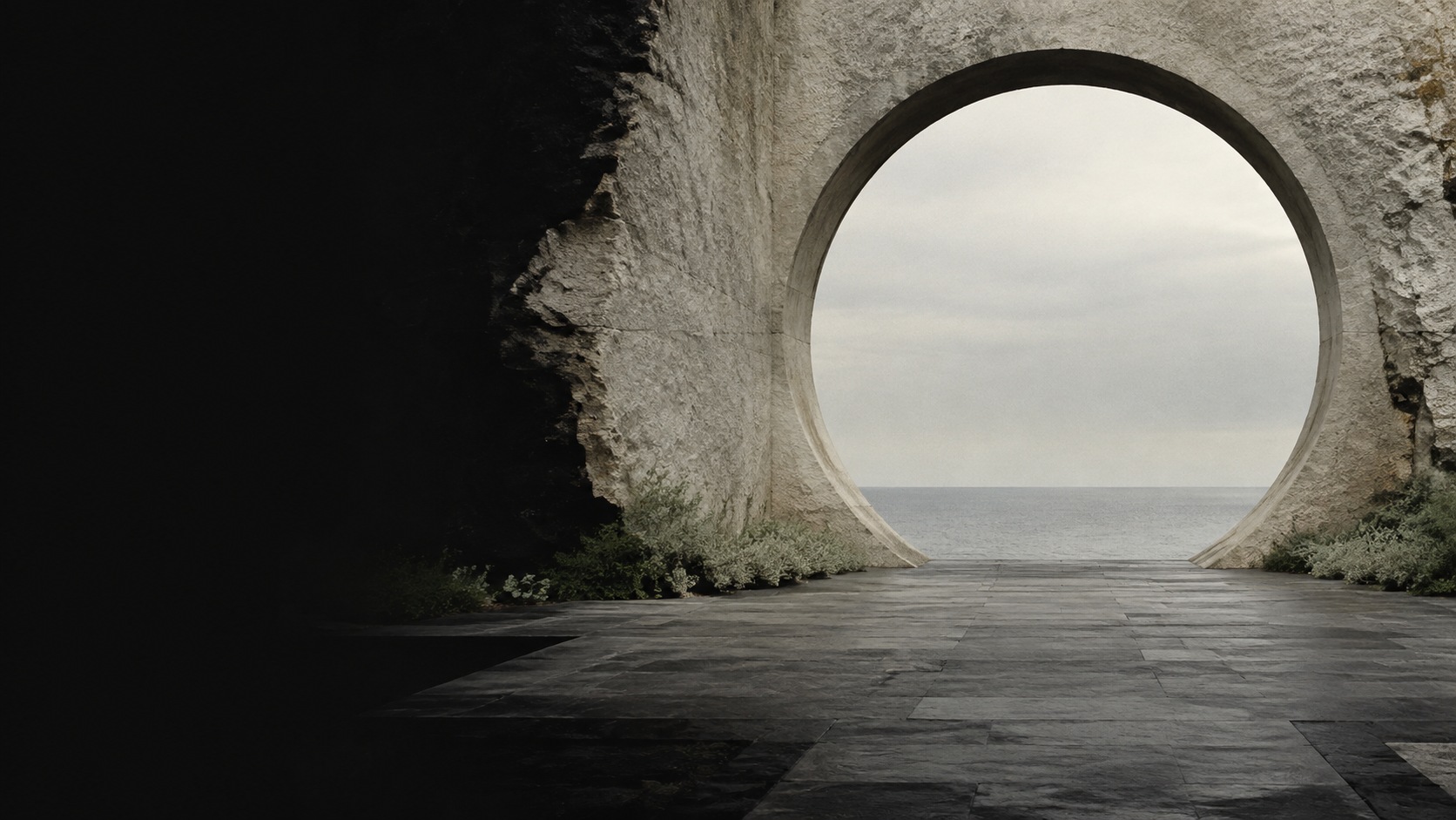 An imagined stone aperture framing a quiet sea horizon